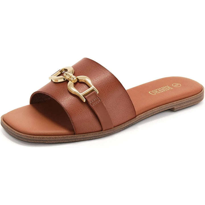 Stylish women's beige slide sandals featuring a chic buckle detail & open toe for a trendy summer look.