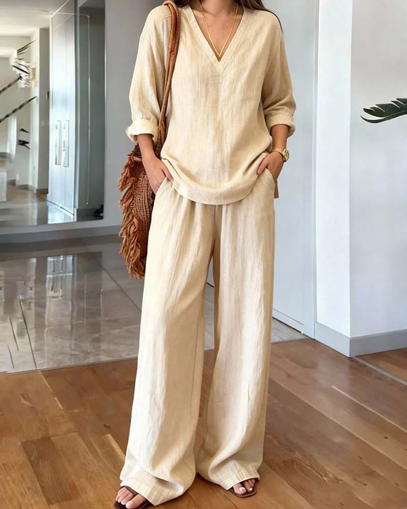 Women's beige V-neck long-sleeve wide-leg co-ord set, an elegant & comfortable two-piece outfit.