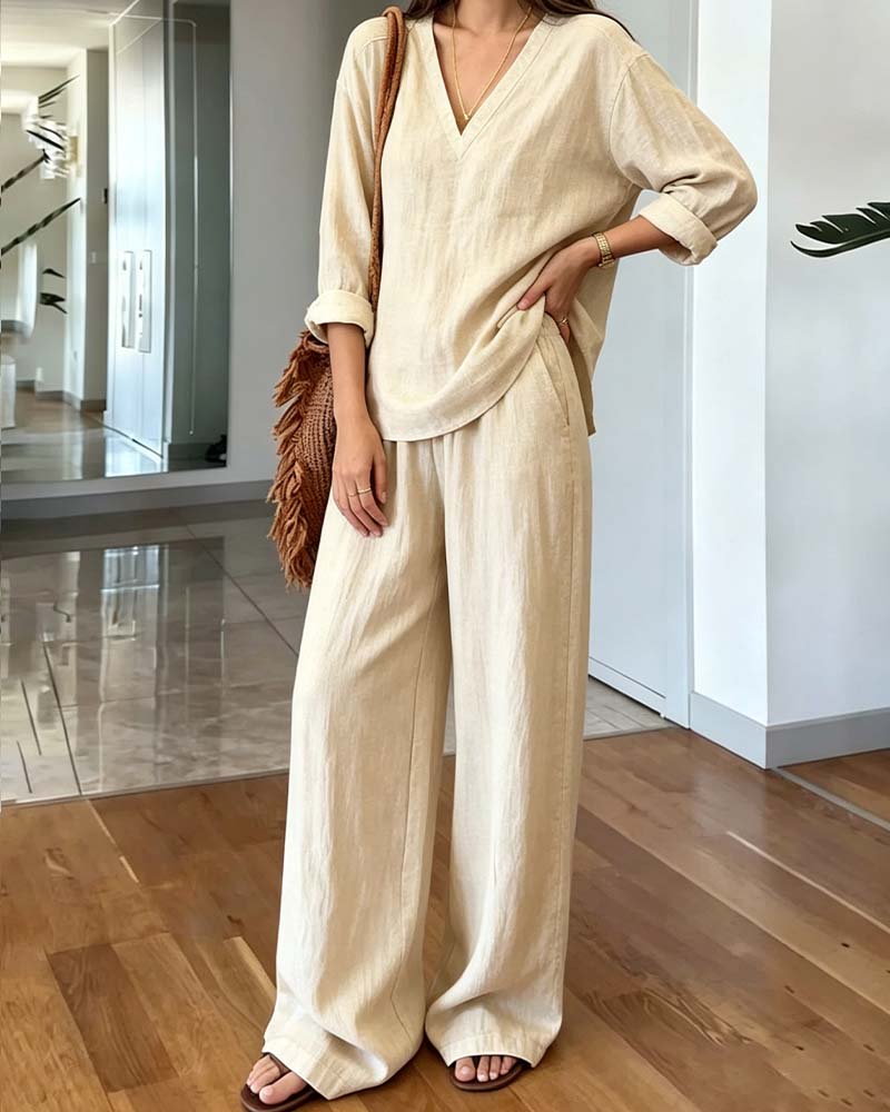 Versatile women's beige V-neck long-sleeve wide-leg co-ord set, perfect for casual or dressed-up looks.