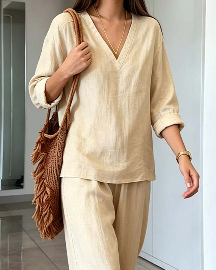 Comfortable women's beige V-neck long-sleeve and wide-leg co-ord set, an effortlessly elegant casual outfit.