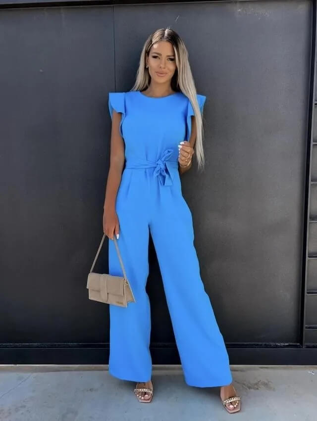 Flowy wide leg jumpsuit with a belted waist and elegant butterfly sleeves, creating a flattering silhouette.
