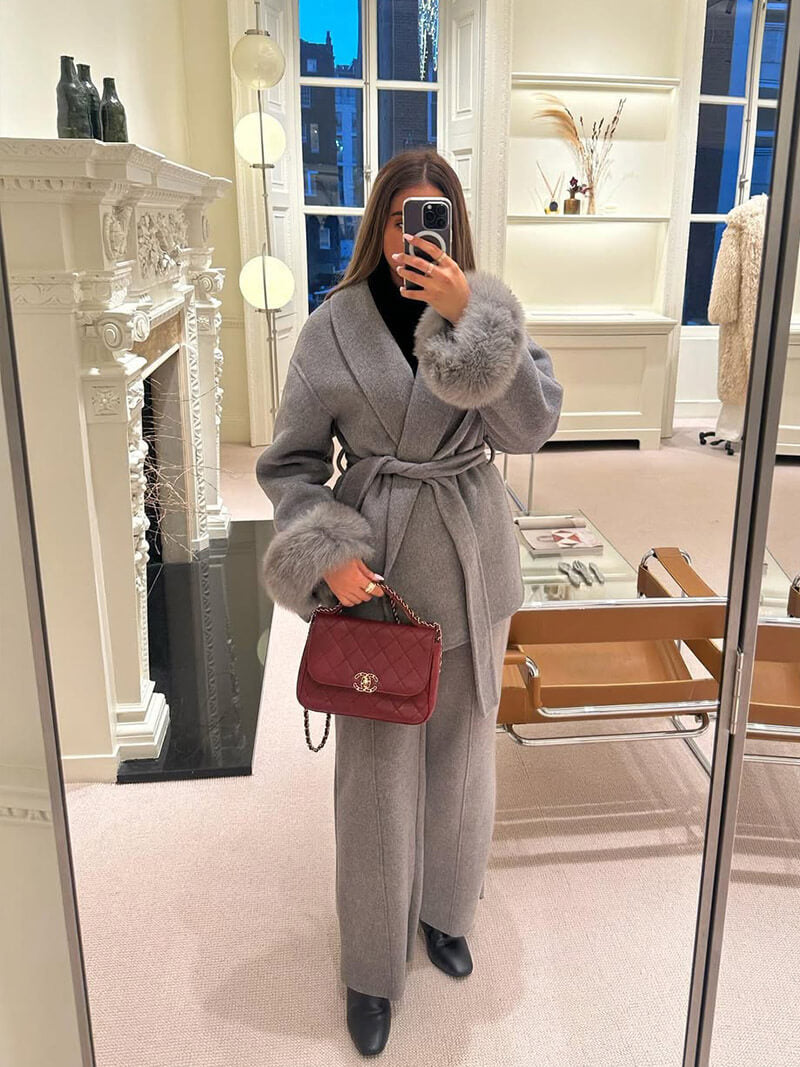 Women's elegant wrap coat, a belted design with luxurious faux fur cuffs for ultimate style.