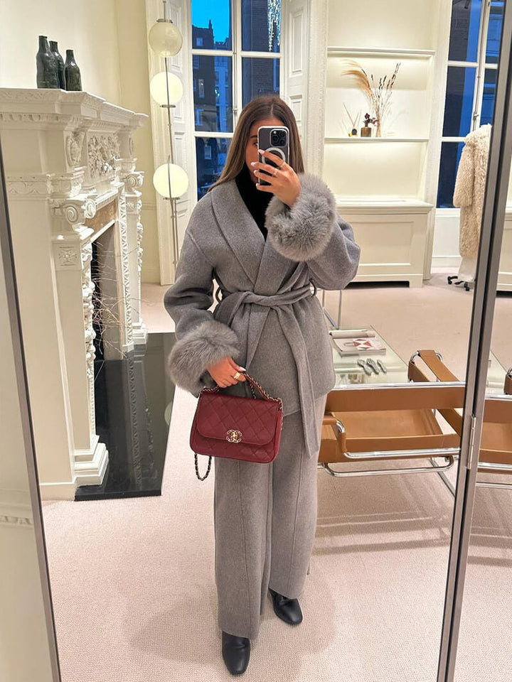 Women's elegant wrap coat, a belted design with luxurious faux fur cuffs for ultimate style.