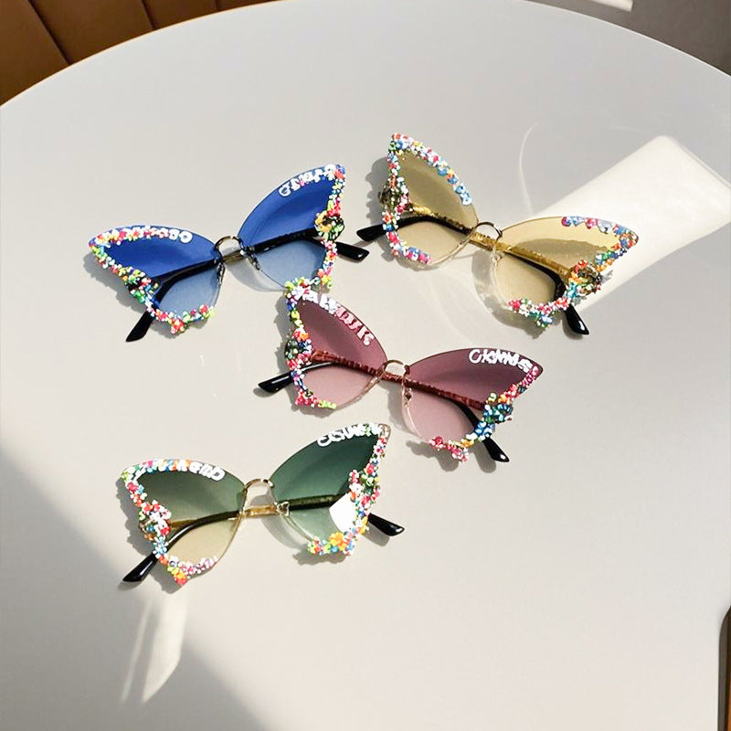 Colorful women's butterfly frame sunglasses, a unique party accessory and fashion statement. UV protection.