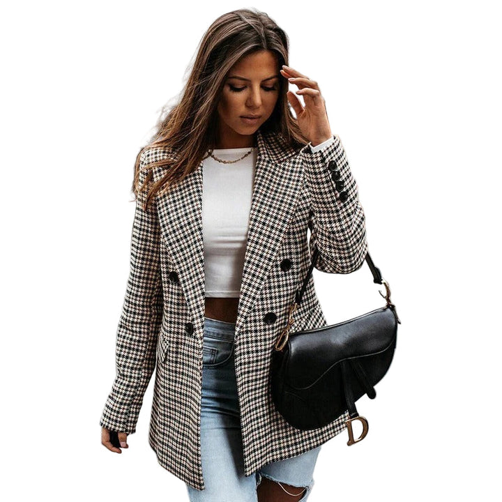 Sophisticated women's tailored blazer with a classic checked pattern, ideal for professional office attire.