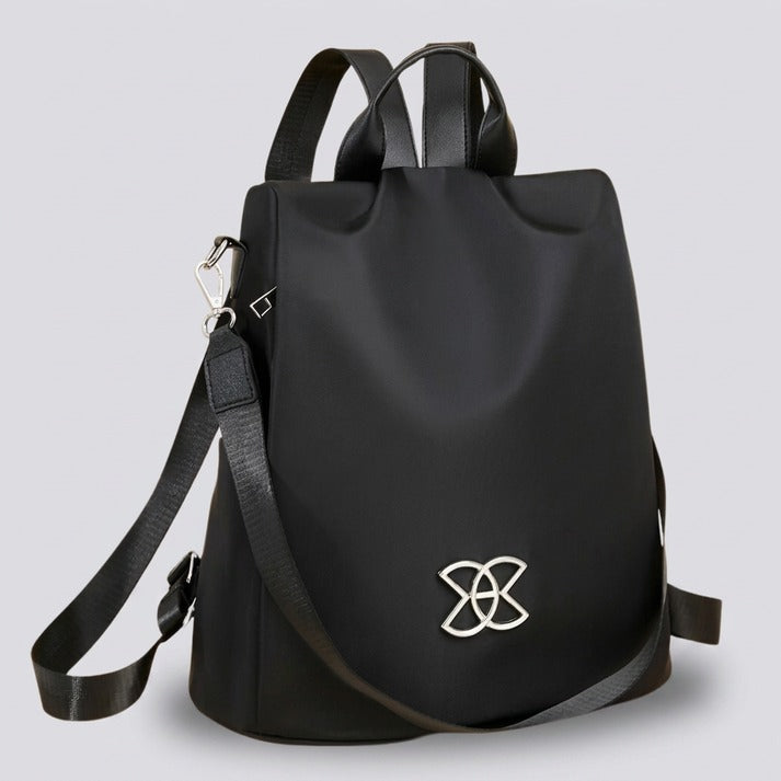 Organized brown women's anti-theft crossbody bag. Multi-pocket design for secure everyday carry & travel.
