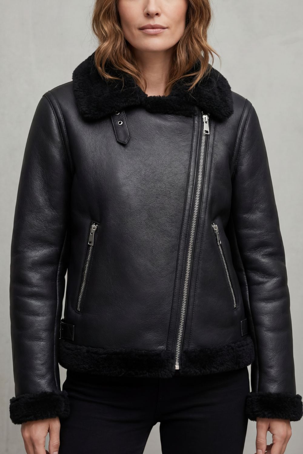Women's black asymmetrical zip biker jacket, chic outerwear for a stylish and cozy look.