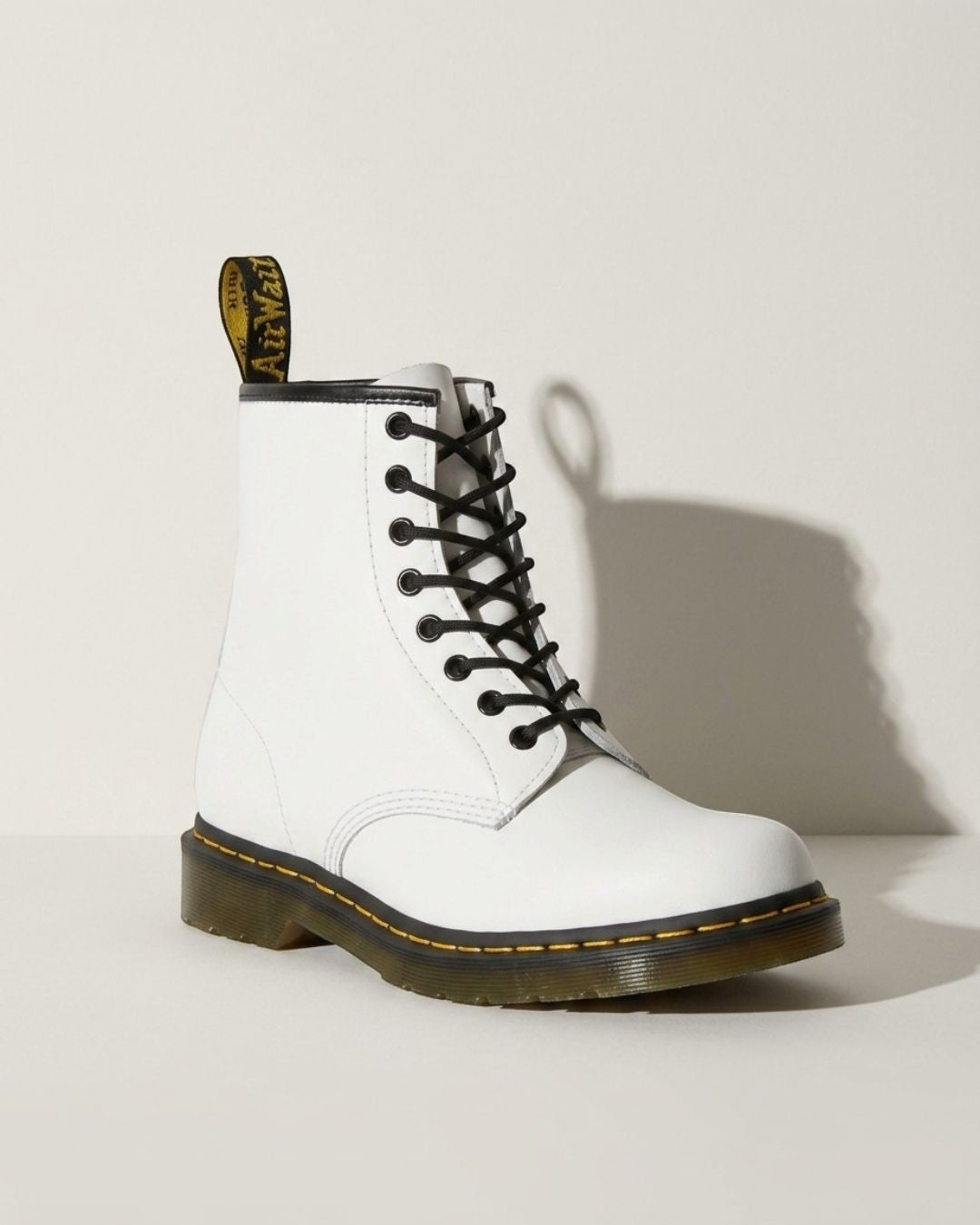 Women's sturdy black lace-up combat ankle boots, ideal for autumn, winter, and versatile urban fashion.