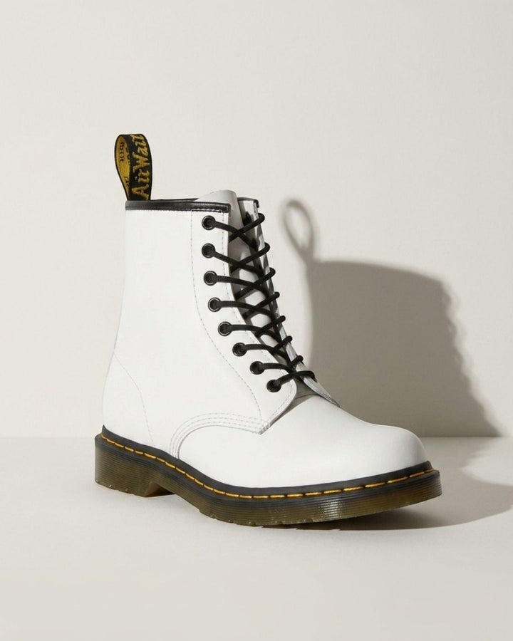 Women's sturdy black lace-up combat ankle boots, ideal for autumn, winter, and versatile urban fashion.