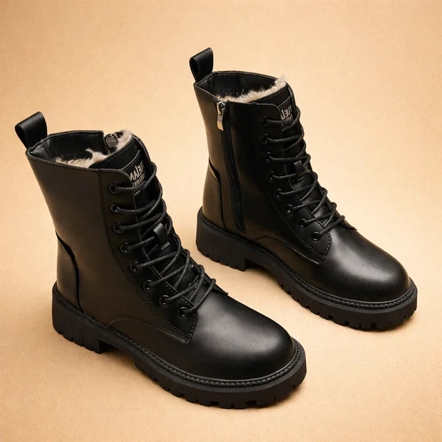 Women's black combat lace-up insulated ankle boots for winter fashion & outdoor style, durable footwear.