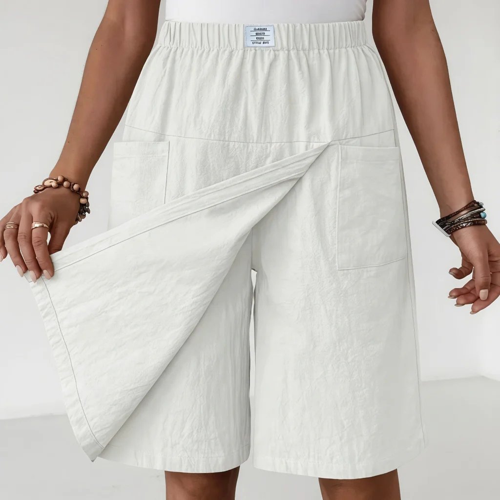 Women's workout shorts featuring an elastic waistband & practical pockets, great for sports, gym, or active days.