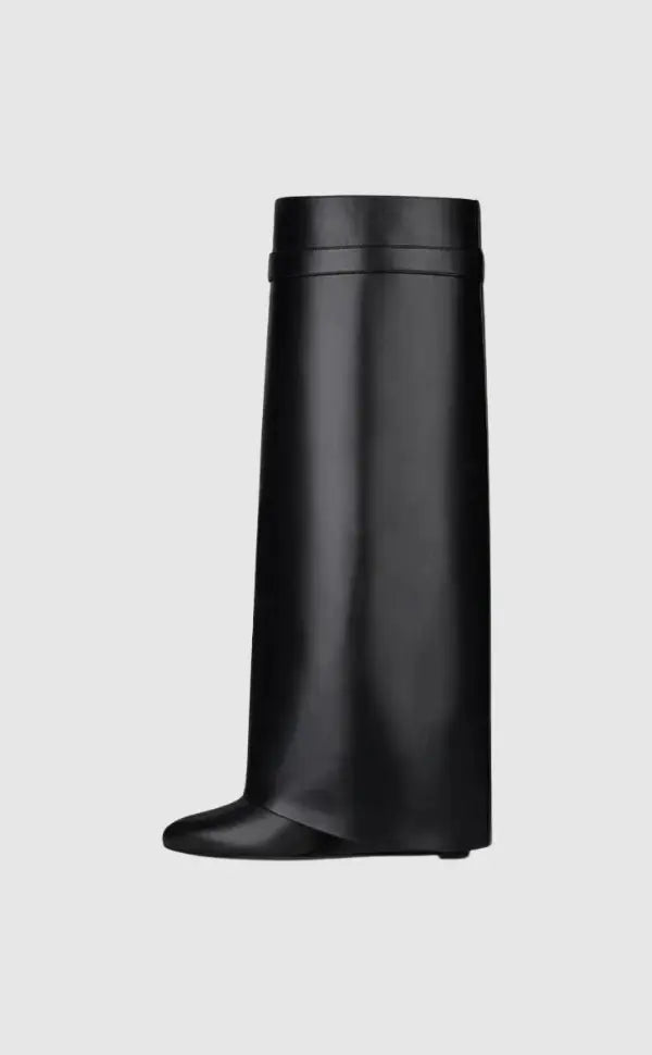 Avant-garde women's black glossy knee-high boots, perfect for street style, with a unique wedge design.