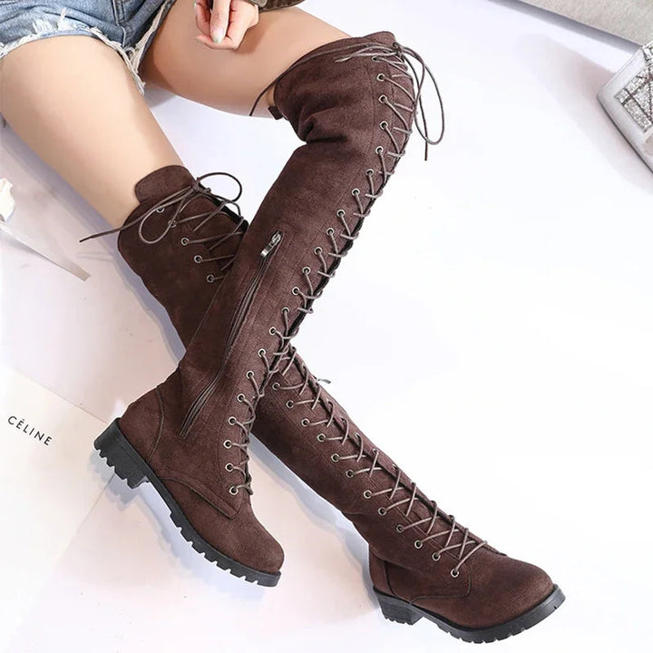 Chic women's over-the-knee boots with front lace-up detail, ideal stylish footwear for fall and winter.