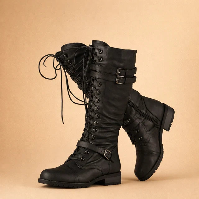Fashionable yellow over-the-knee boots with lace-up detail & tall shaft, a bold statement for women's winter style.