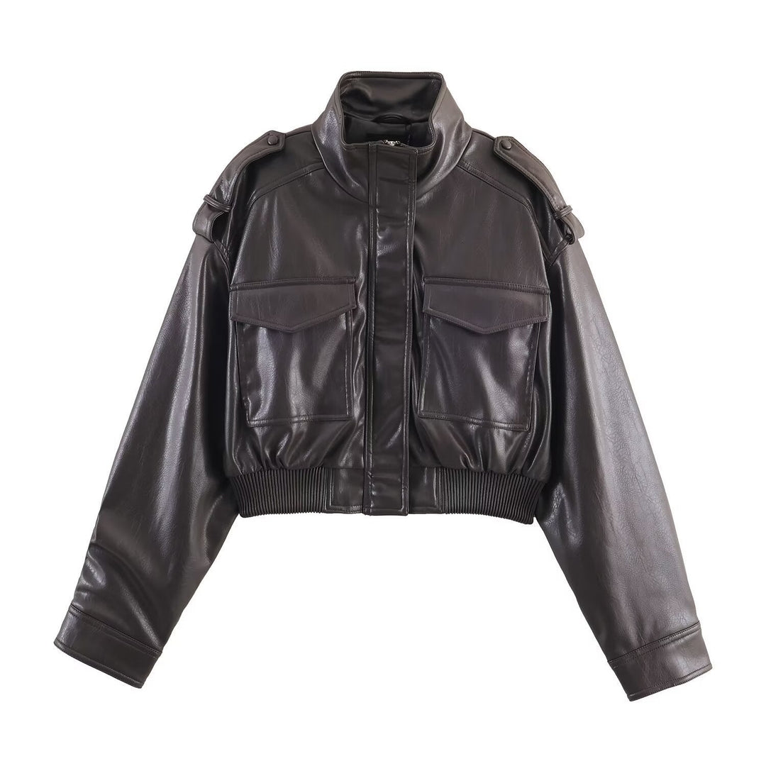 Women's black leather cropped bomber jacket, perfect for chic & edgy layering. Modern silhouette, fall/spring fashion.