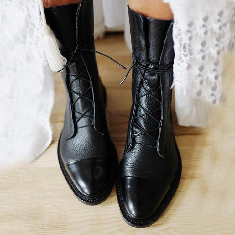Women's black leather lace-up ankle boots, classic style for versatile everyday wear.