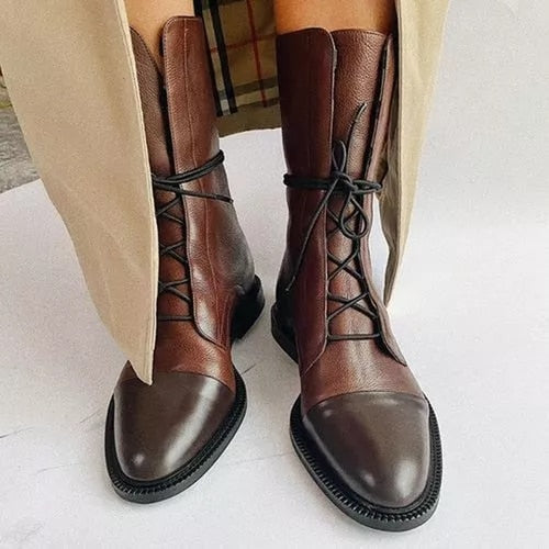 Timeless women's leather lace-up ankle boots, designed for classic comfort and enduring style.