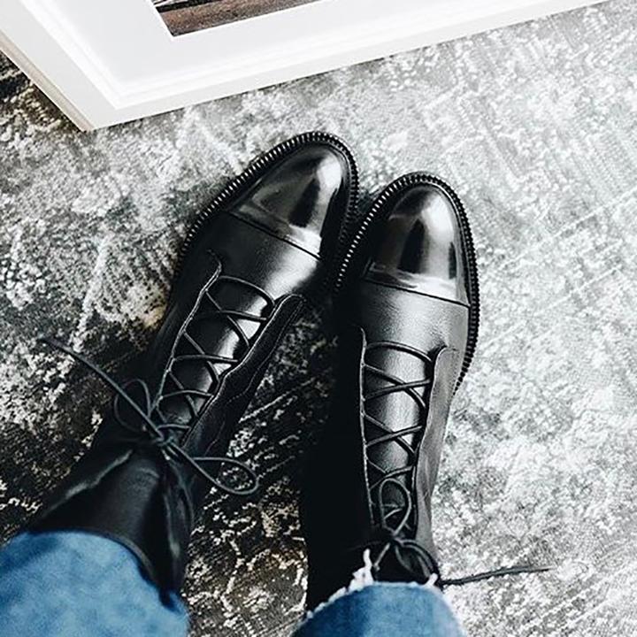 Everyday women's lace-up ankle boots, offering timeless style & comfort for urban explorations.