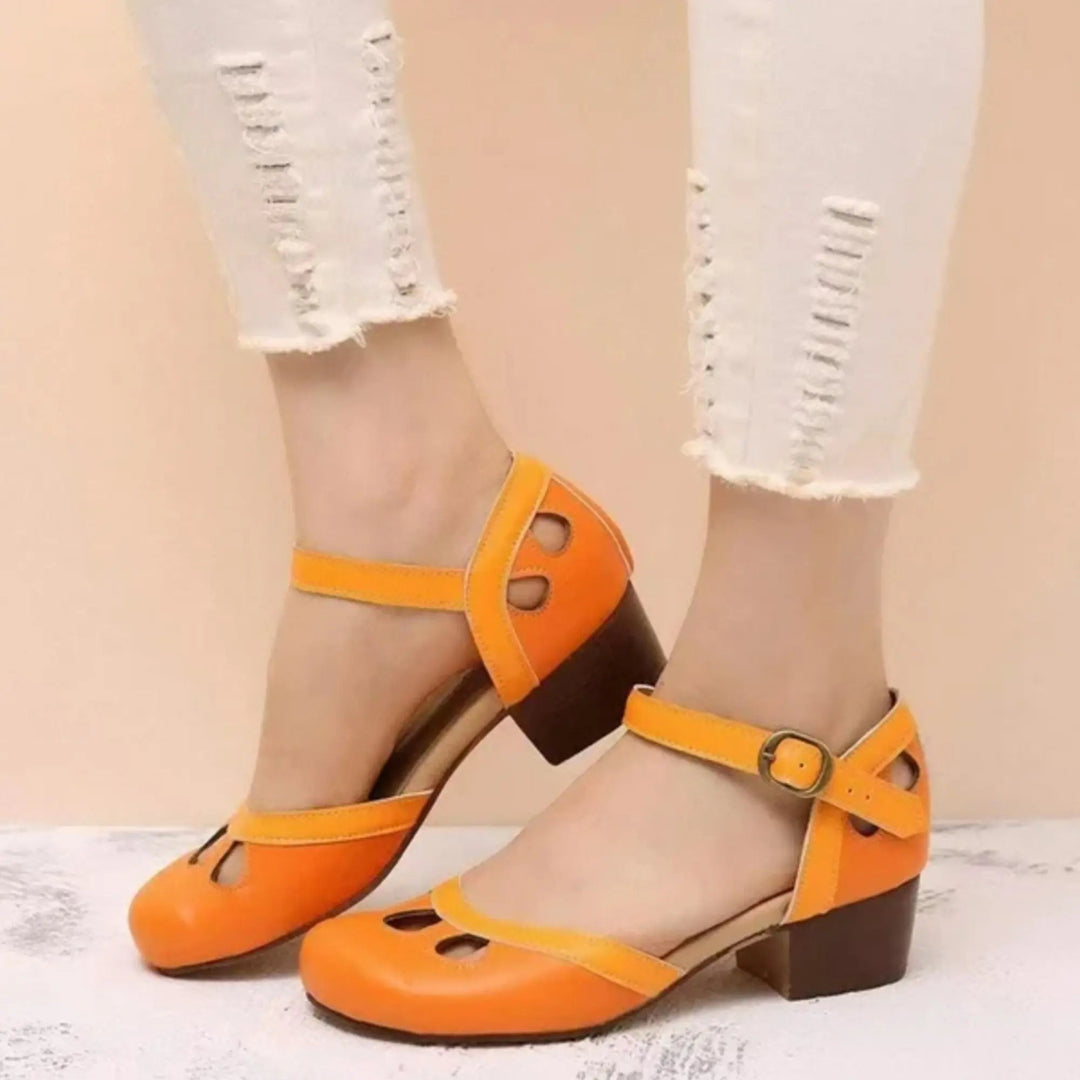 Comfortable women's Mary Jane flats with ankle strap & cutout detail, ideal for everyday vintage-inspired casual wear.