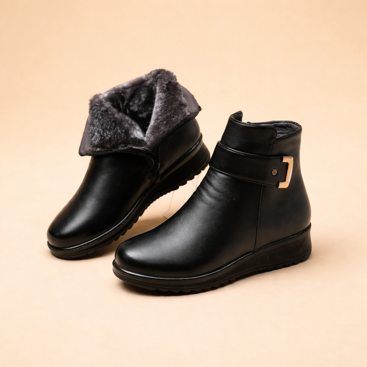 Women's black non-slip winter boots, cozy and warm, perfect for secure everyday comfort in snow.