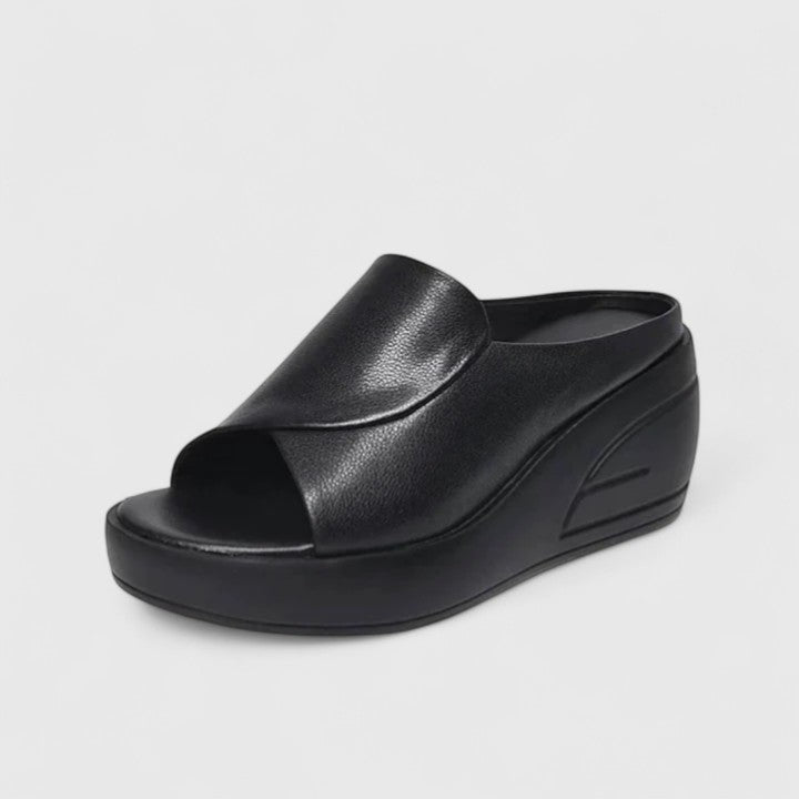 Women's black orthopaedic wedge sandals with arch support for comfortable all-day foot pain relief, ergonomic design.