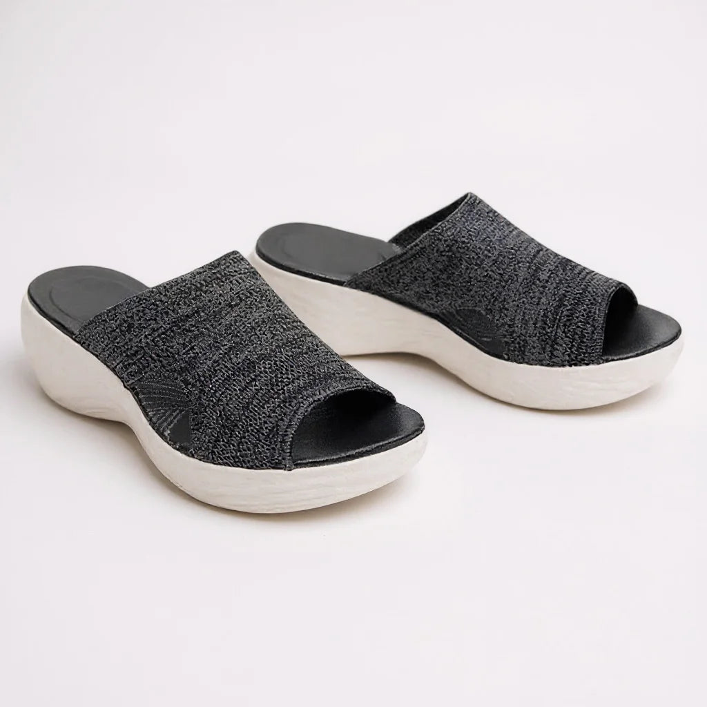 Elegant women's blue wedge slide sandals with adjustable strap, orthopedic arch support, and comfortable design.