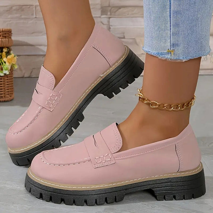 Versatile women's platform loafers, comfortable slip-ons with a chic vamp strap & chunky sole.