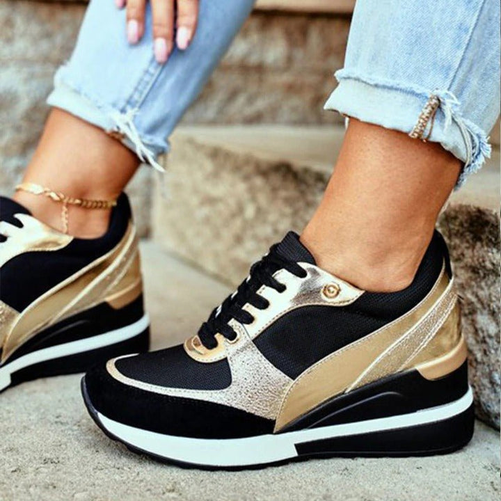 Trendy women's black platform fashion sneakers for everyday wear, elevating comfort & style.