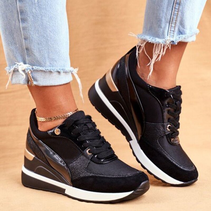 Elevated sole black platform sneakers for women, trendy & comfortable casual footwear.