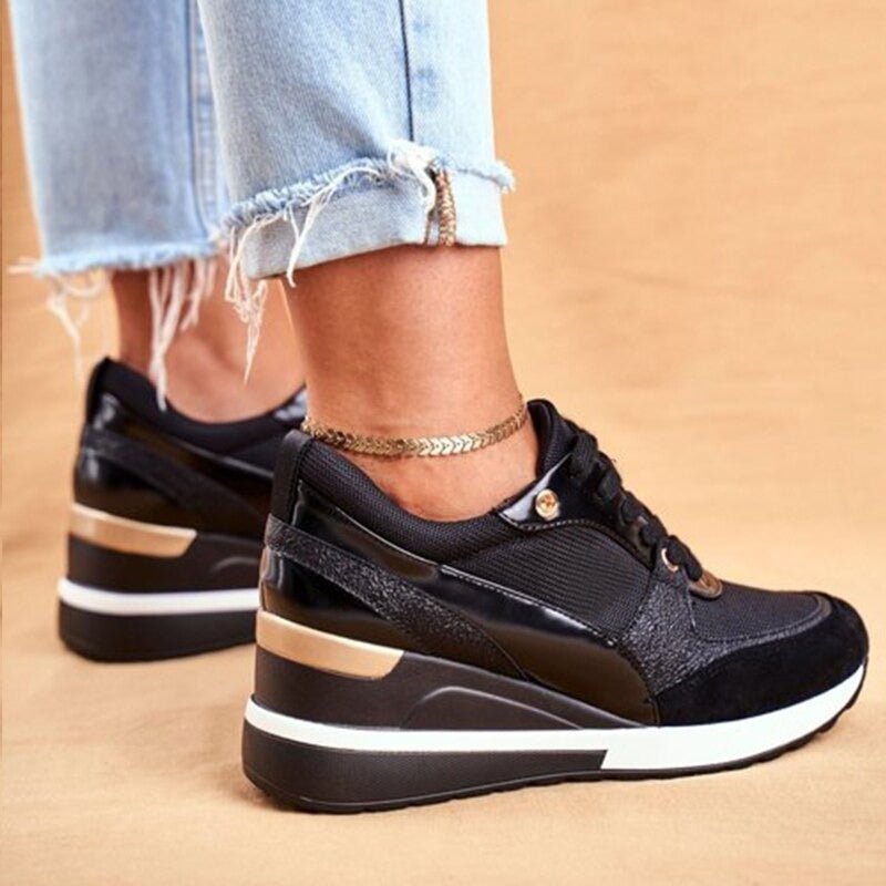 Women's black & gold platform fashion sneakers; comfortable, trendy, & perfect for street style.