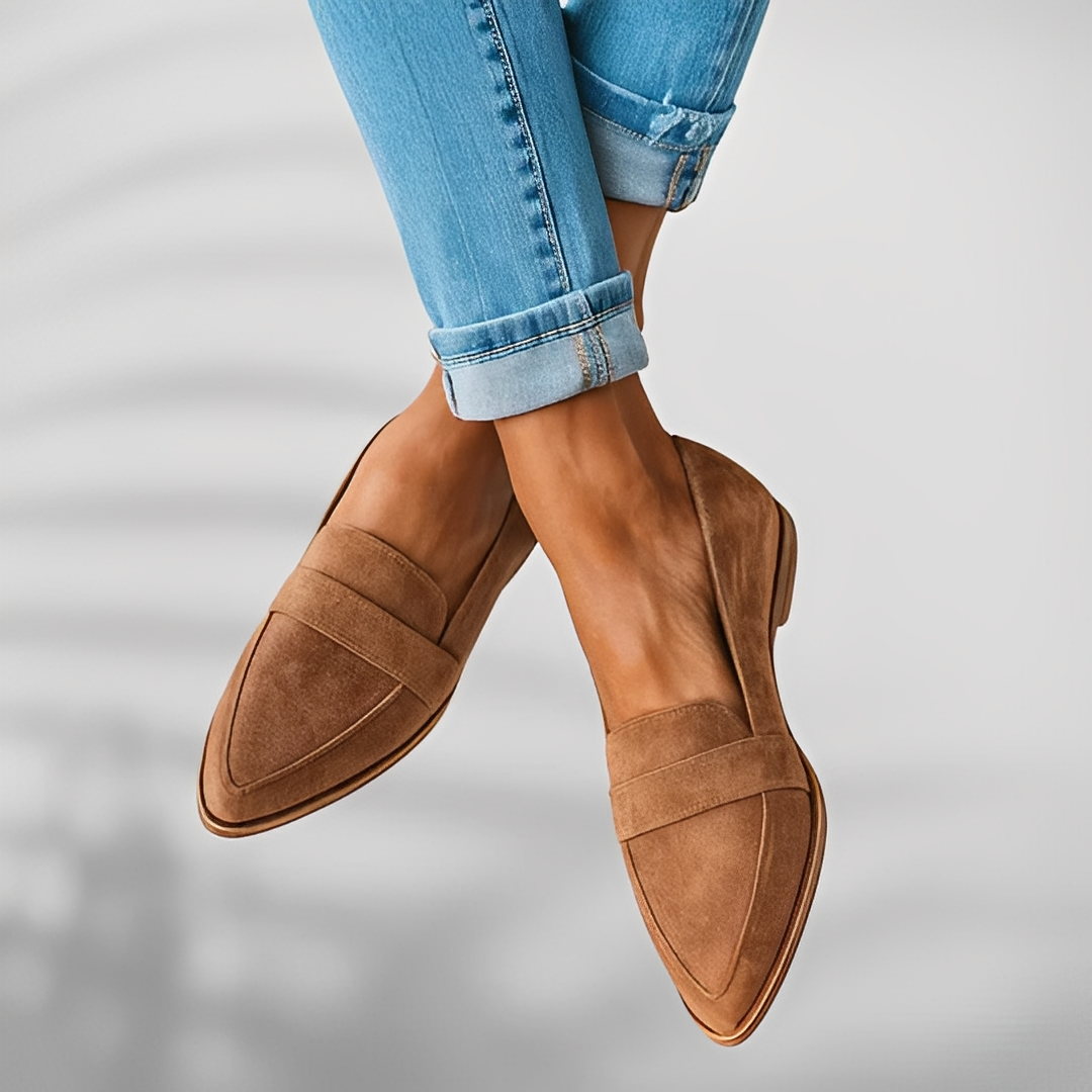 Versatile women's pointed toe everyday flats in navy, perfect for smart casual or professional work attire. Comfortable.