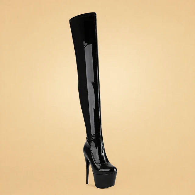 Red statement thigh high platform boots for women, with a high stiletto heel. Perfect for party & night out fashion.