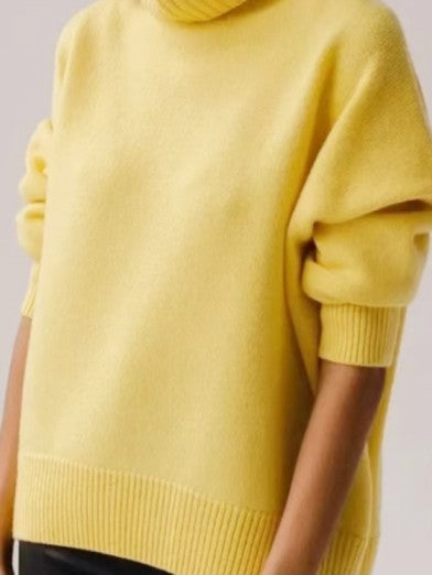 Soft knit women's black turtleneck sweater. Elegant, warm & comfortable long-sleeve top for winter style.