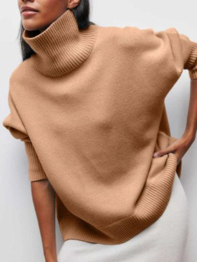 Stylish black turtleneck knit sweater for women. Long sleeve, cozy & elegant, ideal for fall/winter.