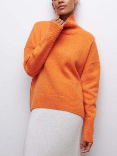 Casual chic women's black turtleneck sweater. Cozy knit, warm & stylish, versatile for any wardrobe.