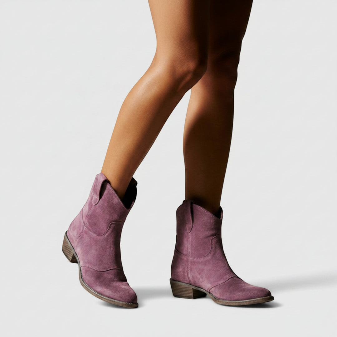 Women's black Western ankle boots, comfortable flat heel, perfect for stylish everyday wear.