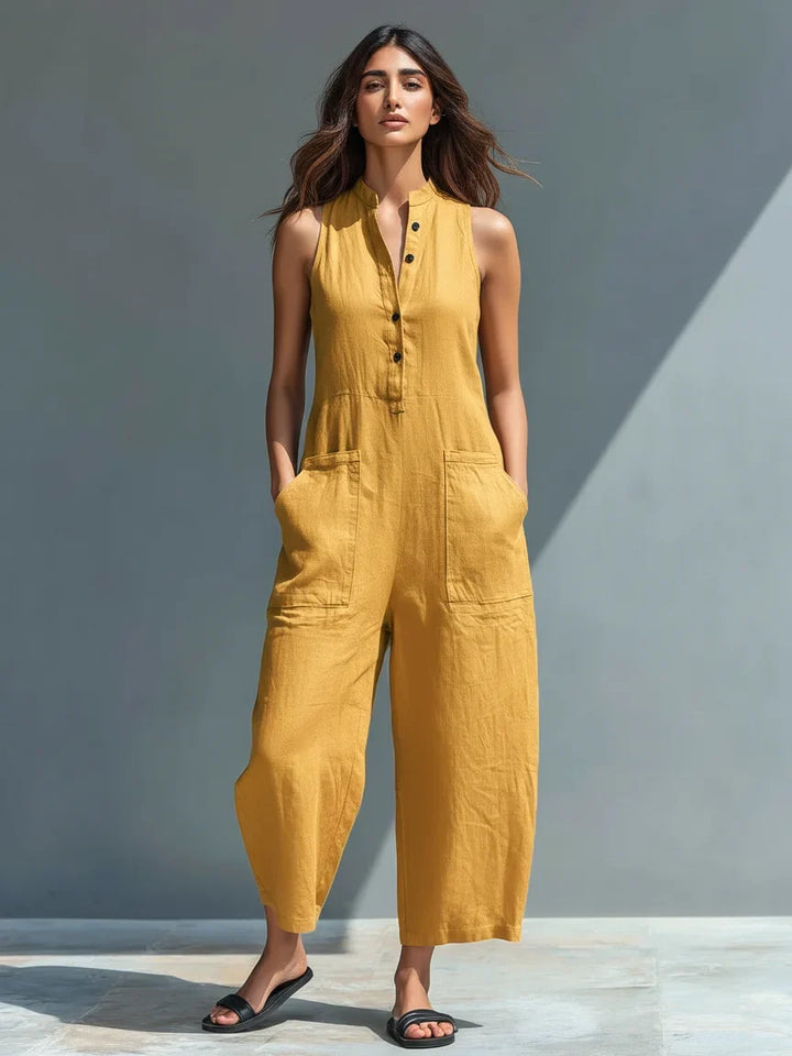 Chic yellow women's one-piece sleeveless jumpsuit with a mandarin collar & trendy wide-leg design.