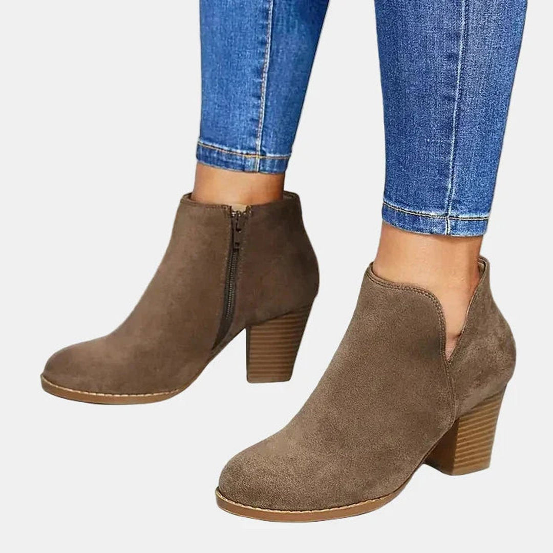 Women's block-heel ankle boots with a convenient side zip, perfect for winter fashion.