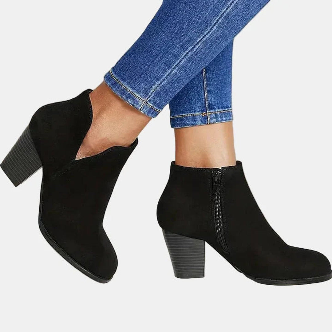 Women's side-zip block-heel ankle boots, designed for comfortable all-day wear and trendy winter fashion.