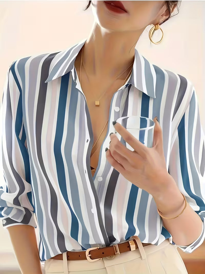 Stylish women's striped button-up shirt. Casual long-sleeve blouse with a relaxed fit, ideal for office or daily wear.