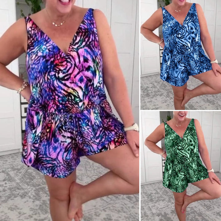 Women's blue animal print V-neck playsuit, a stylish short-sleeve summer romper perfect for casual chic vacation wear.