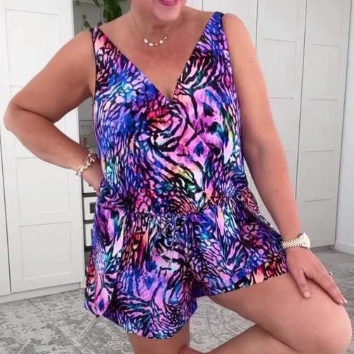 Stylish women's animal print V-neck playsuit with short sleeves, a comfortable one-piece romper for summer fashion.