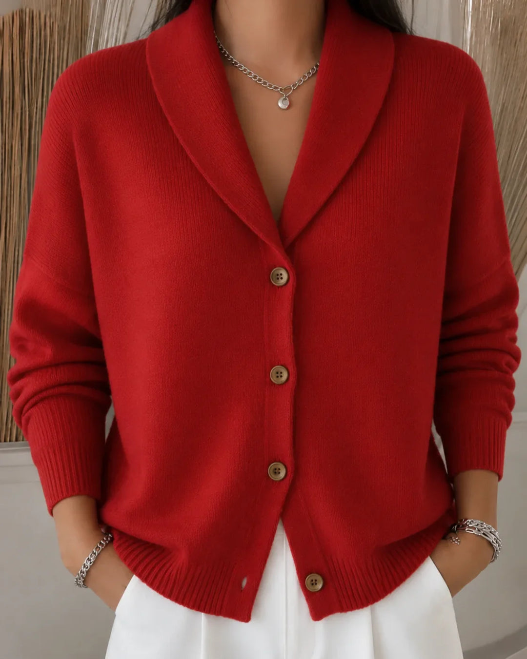 Orange collared button-front long sleeve cardigan for women. Soft, comfortable, and versatile fashion layering piece.