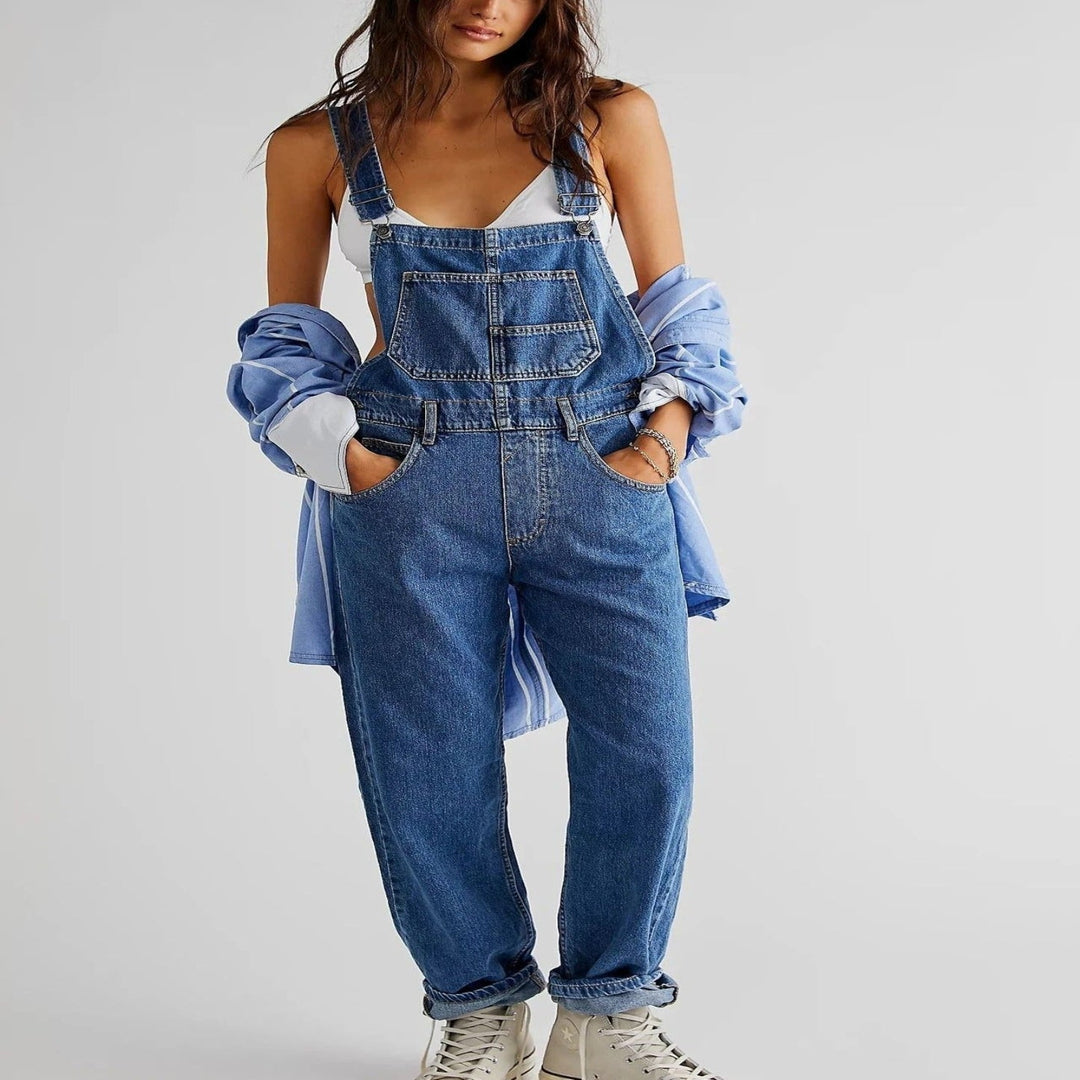 Stylish women's denim jumpsuit, perfect for spring and summer fashion. Features a relaxed fit for comfortable casual wear.
