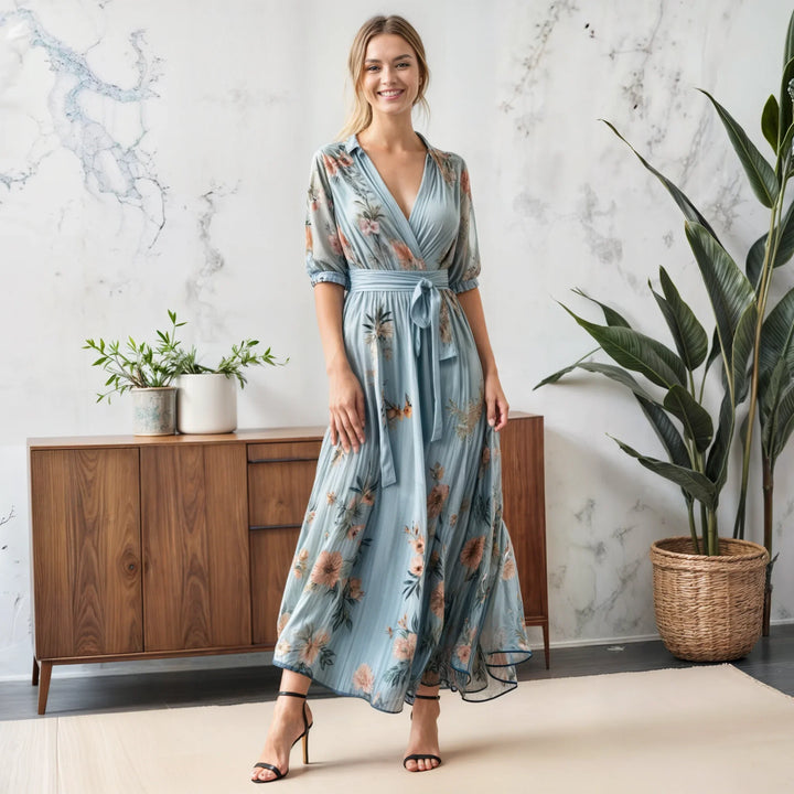 Feminine blue floral midi dress with puff sleeves, V-neck, and tie-waist. Perfect for spring & summer casual wear.