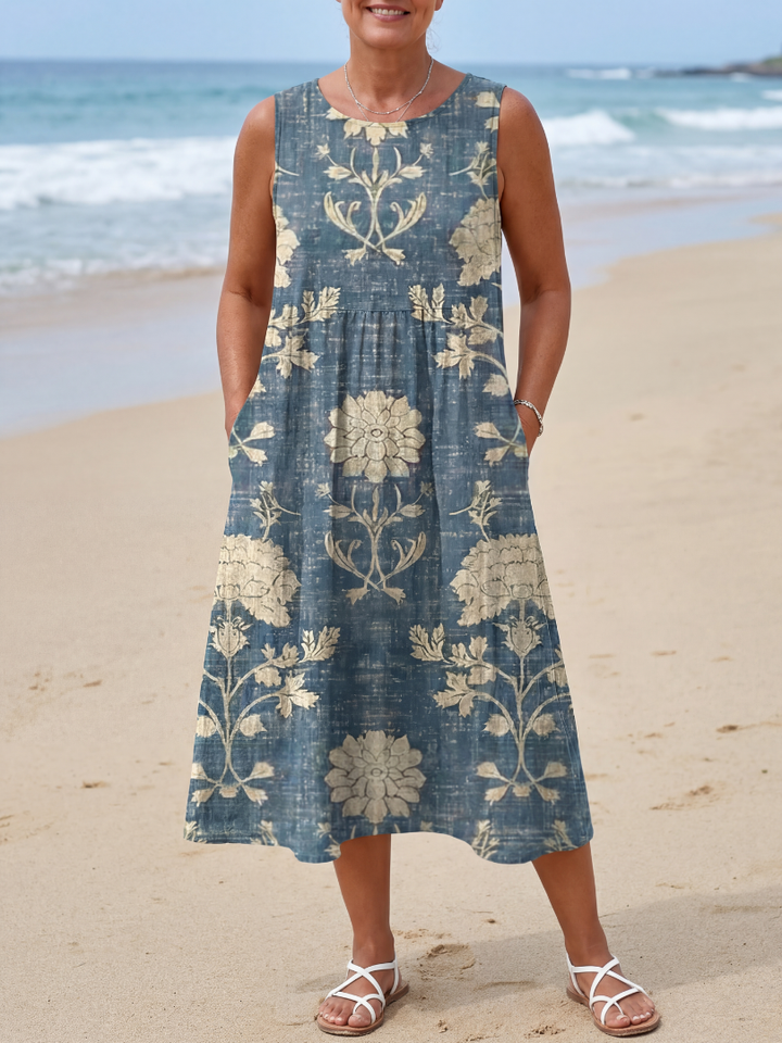 Blue floral print midi dress for women. Casual, easywear summer dress with a comfortable, relaxed fit.