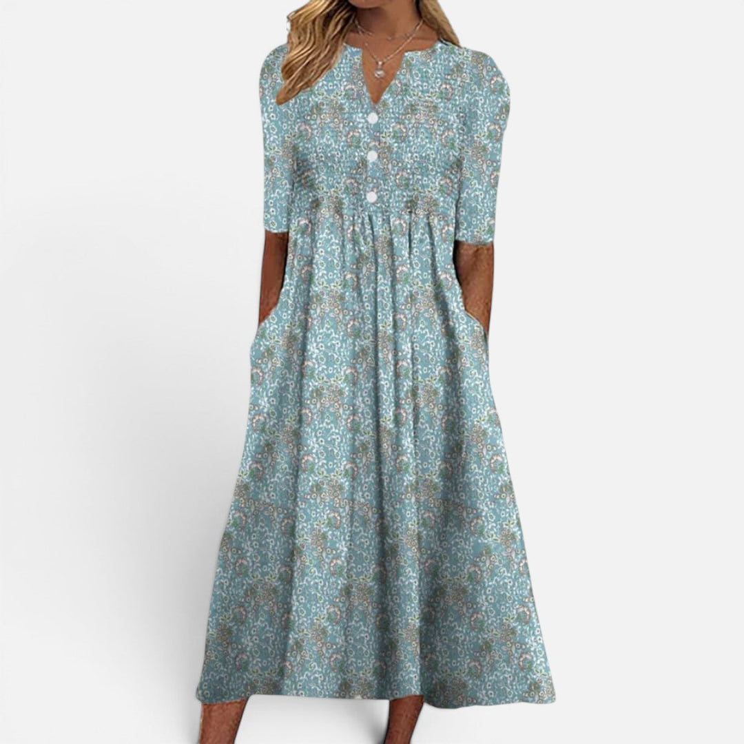 Elegant women's floral buttoned midi dress with practical pockets, ideal for versatile everyday spring and summer style.