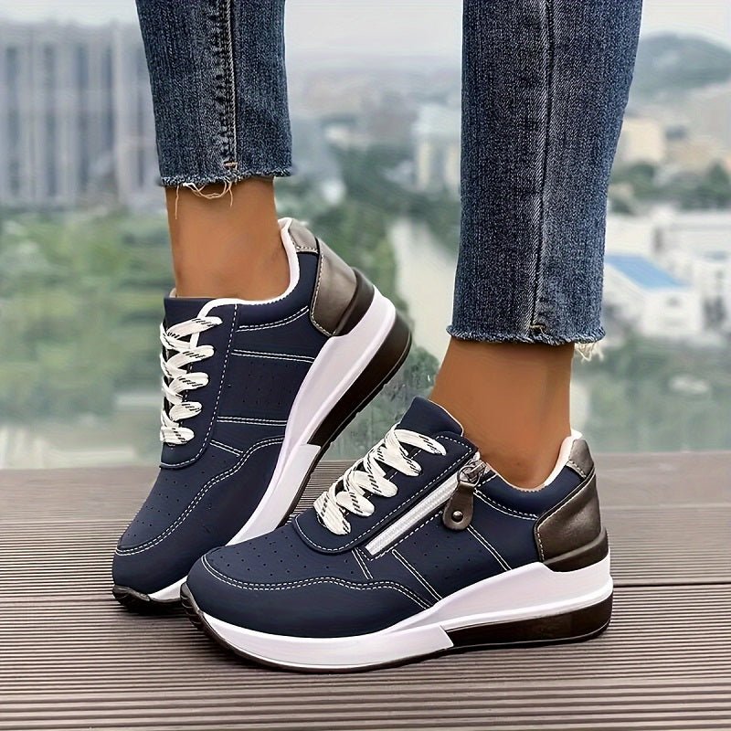 Women's blue orthopedic comfort trainers with lace-up low-cut design, ideal for walking and everyday supportive wear.