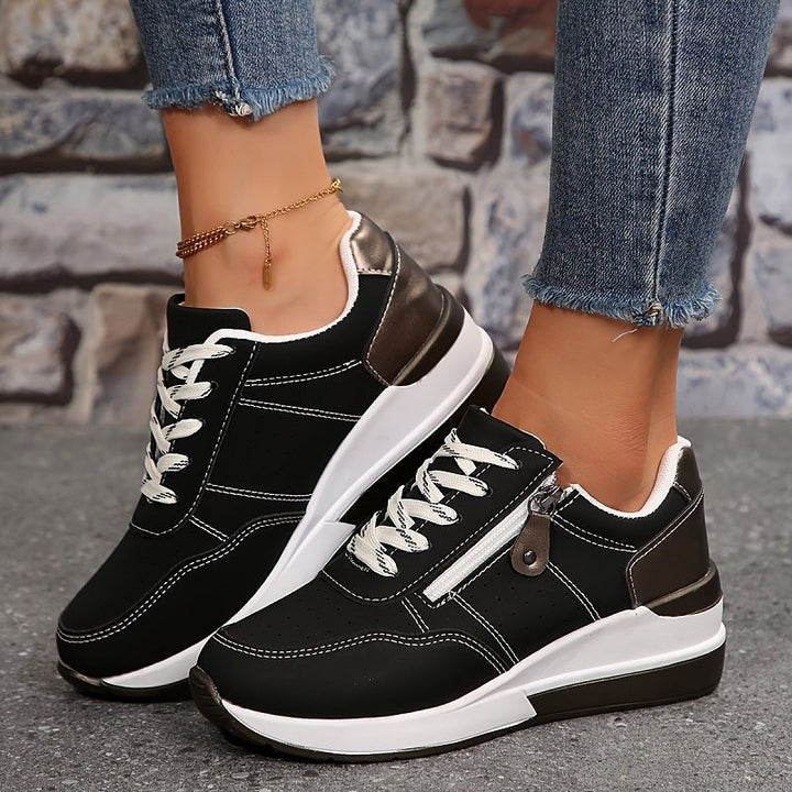 Grey women's lace-up low-cut trainers, orthopedic comfort for athletic casual style & everyday walking.