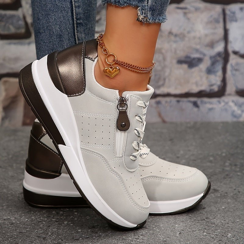 Lace-up women's orthopedic comfort trainers in low-cut style, perfect supportive footwear for daily wear.